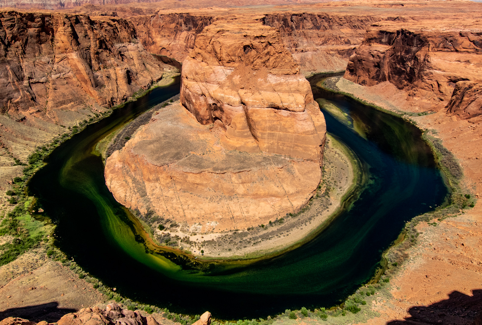 Horseshoe Bend — Colorado River wrapping around a sandstone butte, viewed from the overlook
